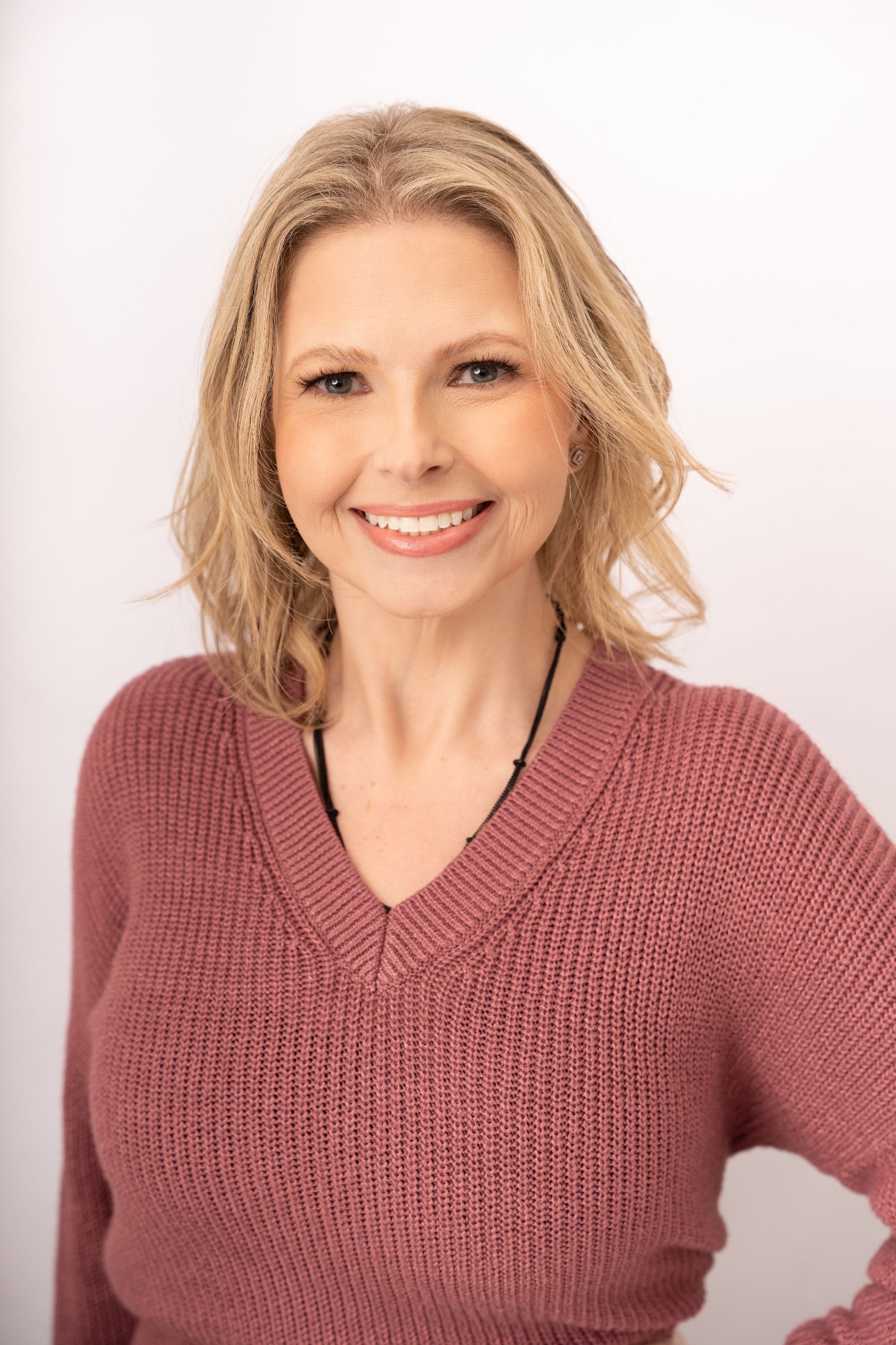 Crystal Rowell in a warm, relaxed portrait